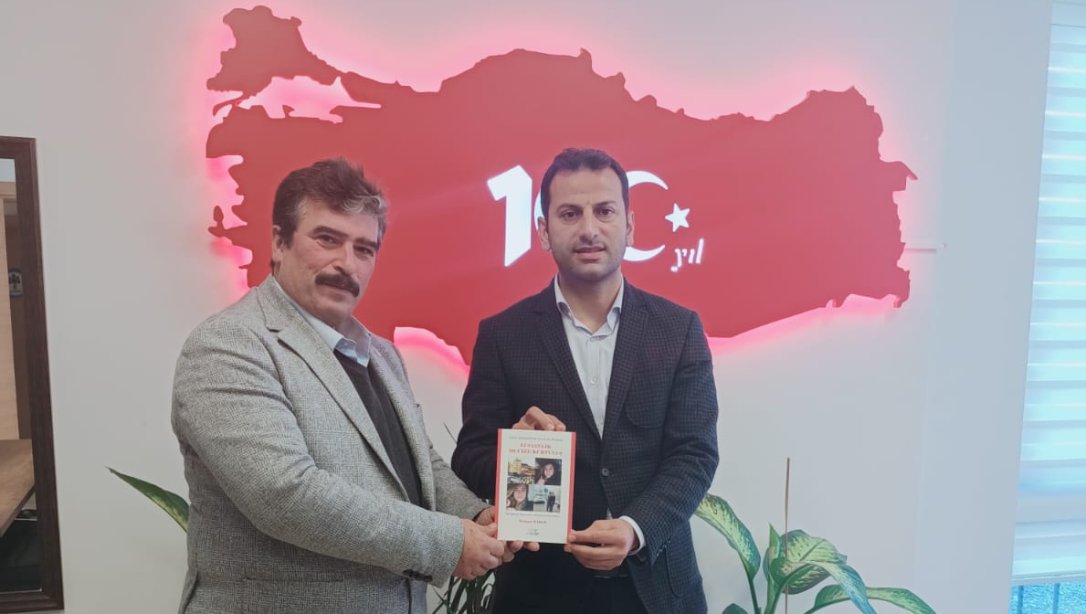 Milli Eğitim Müdürümüz Sn. Mustafa DANIŞMAN'a Kitap Takdimi